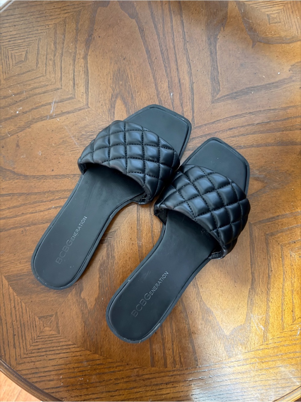 BCBGeneration Black Quilted Slide Sandals